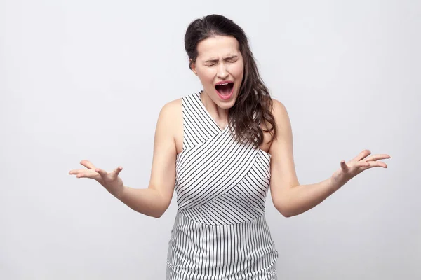 Portrait Angry Young Brunette Woman Striped Dress Standing Crossed Arms — Stock Photo, Image