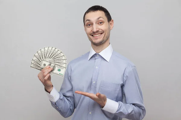 Portrait Satisfied Attractive Young Adult Businessman Blue Shirt Showing Fan — Stock Photo, Image