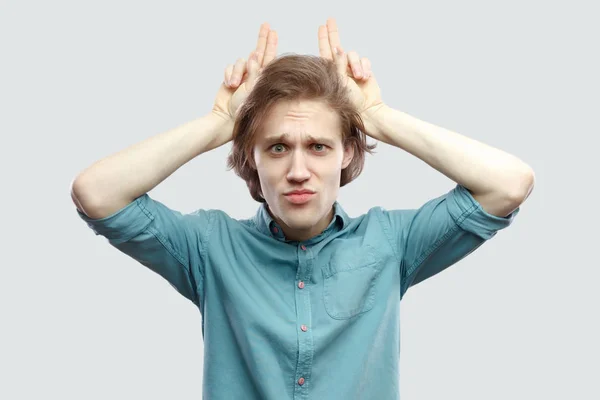 Portrait Anger Long Haired Blonde Man Blue Shirt Standing Bull — Stock Photo, Image