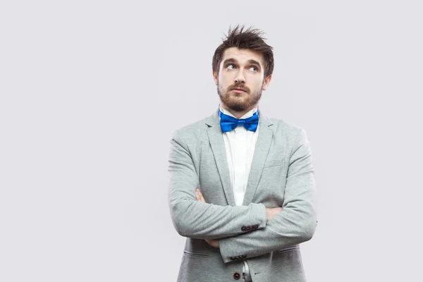 Thoughtful Handsome Bearded Man Casual Grey Suit Blue Bow Tie — Stock Photo, Image