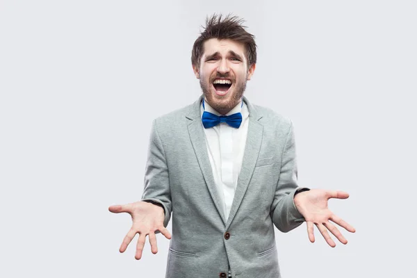 Confused Handsome Bearded Man Casual Grey Suit Blue Bow Tie — Stock Photo, Image