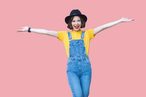 Portrait Excited Beautiful Woman Yellow Shirt Blue Denim Overalls Makeup — Stock Photo, Image
