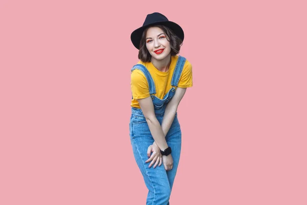 Portrait Positive Beautiful Woman Yellow Shirt Blue Denim Overalls Makeup — Stock Photo, Image