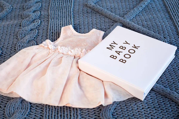 Baby Girl Pink Dress Newborn Book Album Blue Knitting Plaid — Stock Photo, Image