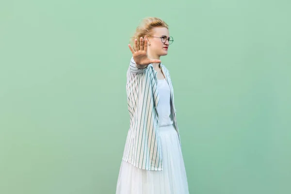 Serious Young Blonde Woman White Striped Blouse Eyeglasses Standing Stop — Stock Photo, Image