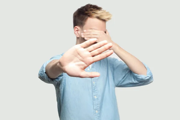 Scared Handsome Young Man Light Blue Shirt Covering His Face — Stock Photo, Image