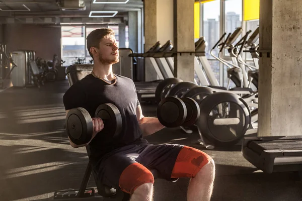 Concentrated Young Adult Handsome Athlete Working Out Gym While Sitting — Stock Photo, Image