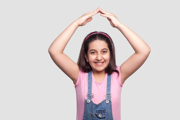 Happy Beautiful Brunette Young Girl Pink Shirt Blue Overalls Showing — Stock Photo, Image