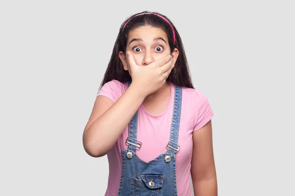 Shocked Brunette Young Girl Pink Shirt Blue Denim Overalls Covering — Stock Photo, Image
