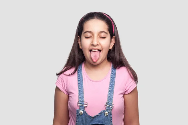 Funny Beautiful Brunette Young Girl Pink Shirt Blue Overalls Showing — Stock Photo, Image