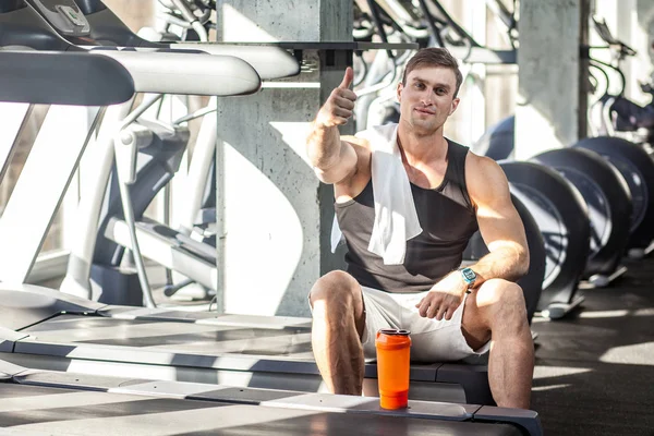 Satisfied Athlete Handsome Masculine Man Sitting Treadmill Exercise Gym Showing — Stock Photo, Image