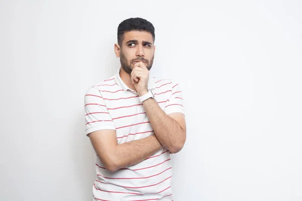 Thoughtful Handsome Bearded Young Man Striped Shirt Looking Away While — Stock Photo, Image