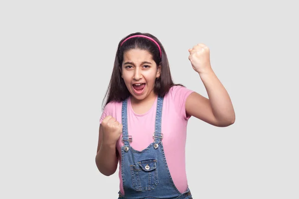 Portrait Rejoicing Winner Brunette Young Girl Pink Shirt Blue Denim — Stock Photo, Image