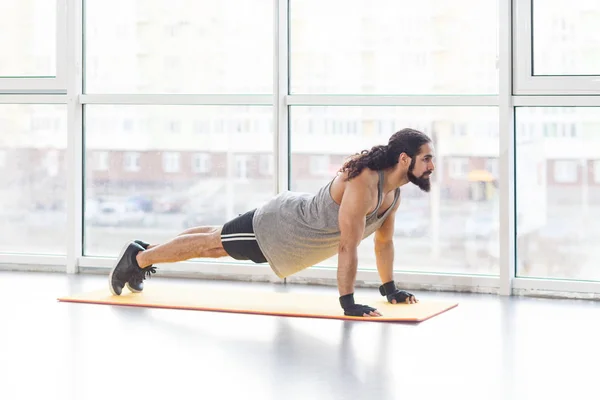 Young Adult Sporty Muscular Man Curly Long Hair Practicing Yoga — Stock Photo, Image