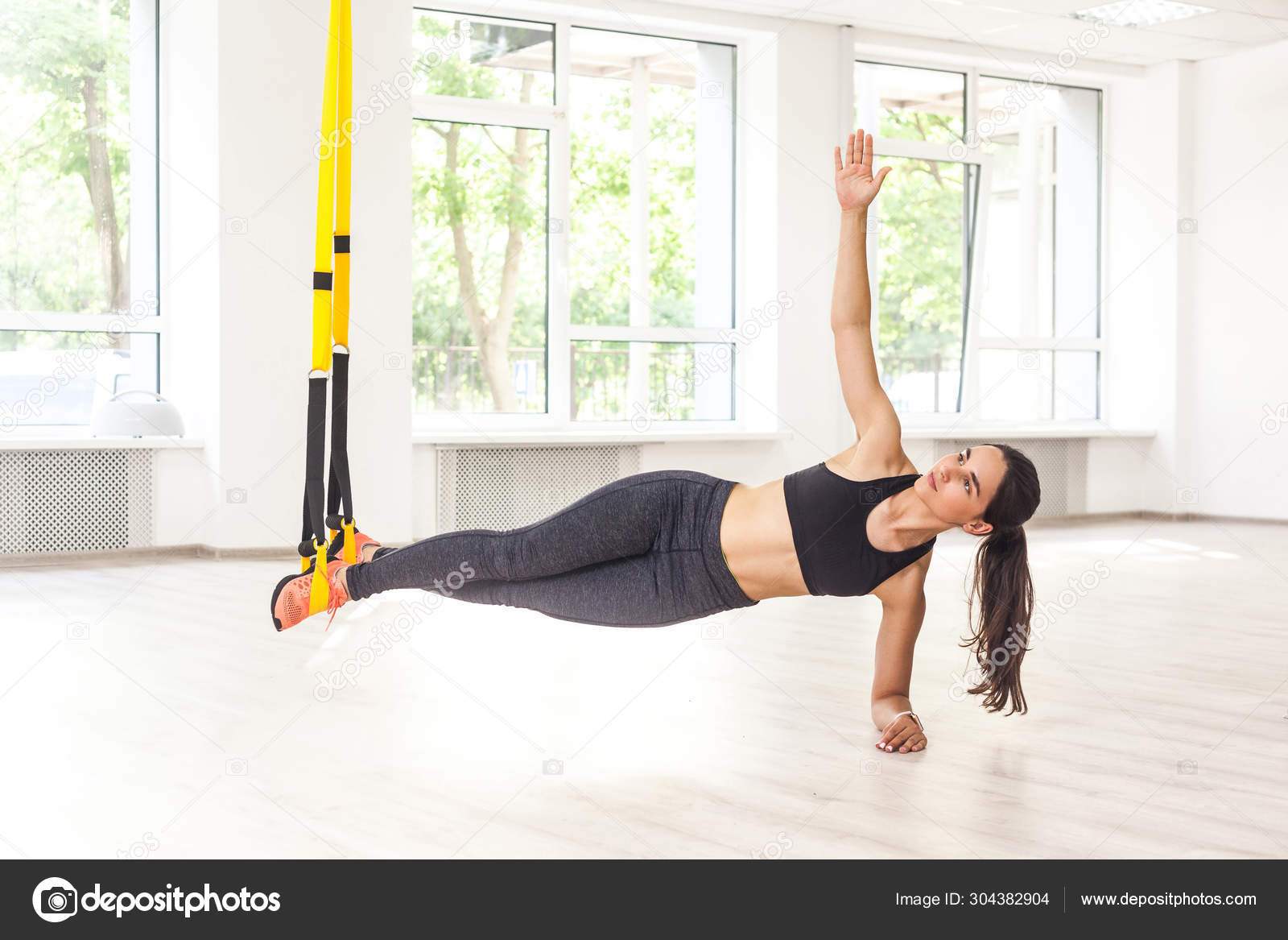 Young Attractive Muscular Woman Black Top Leggings Standing