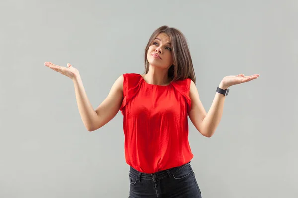 Puzzled Beautiful Brunette Young Woman Red Shirt Standing Raised Arms — Stok fotoğraf