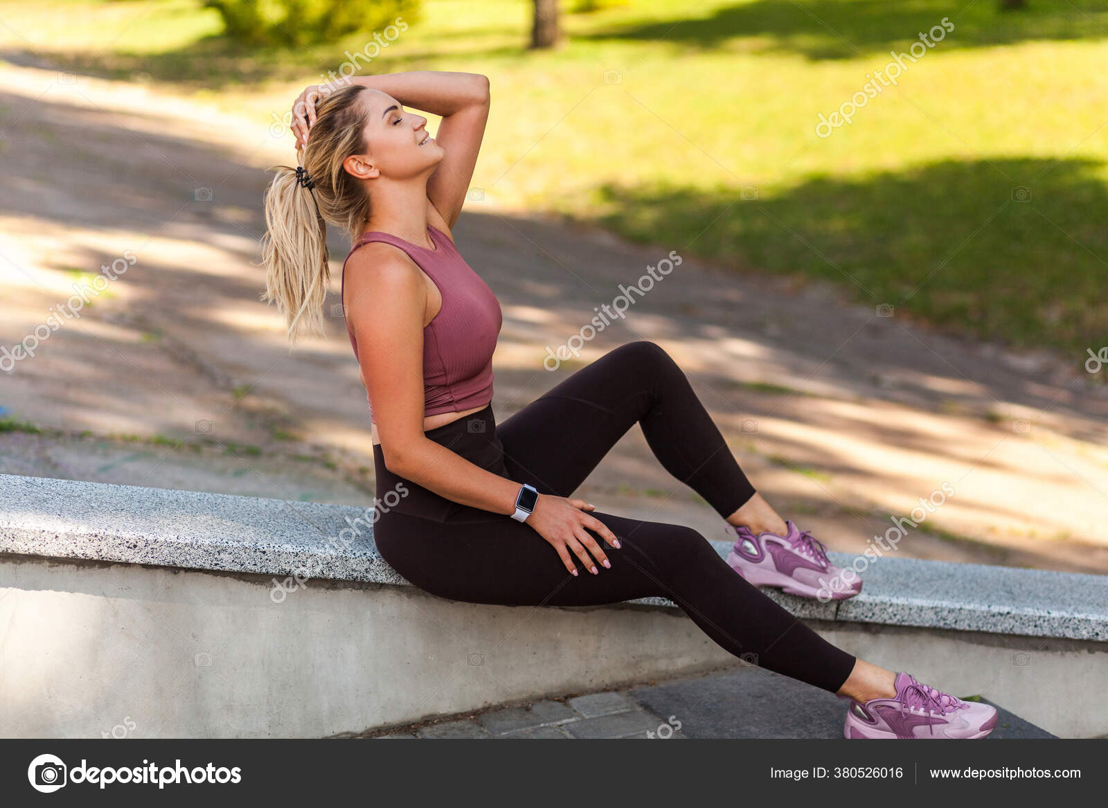 Athletic Sexy Woman Yoga Pants Sitting Stairs Taking Stock Photo by ©khosrork 380526016