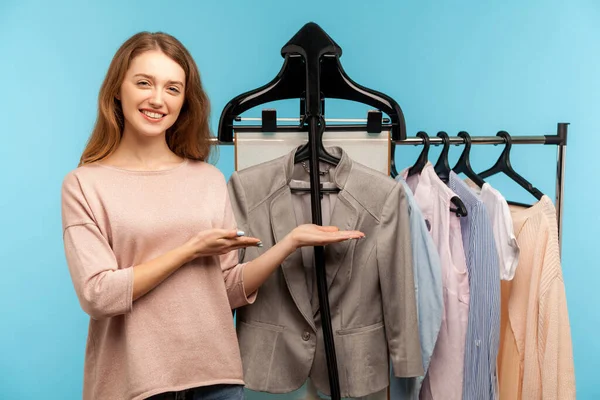 Happy Woman Fashion Stylist Standing Clothes Hang Shelf Designer Store — Stockfoto