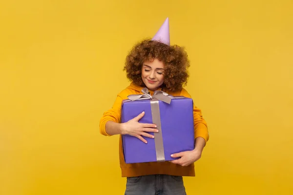 Portrait Excited Happy Curly Haired Woman Embracing Huge Gift Box — 스톡 사진