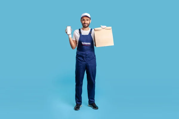 Full Body Portrait Expert Courier Blue Uniform Holding Groceries Bag — Zdjęcie stockowe