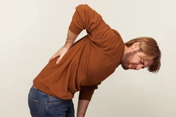 Side View Exhausted Unhealthy Young Man Hunching Touching Aching Back — Stok fotoğraf