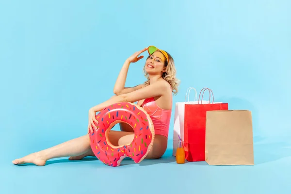 Portrait Joyful Glamour Girl Swimsuit Sitting Rubber Ring Shopping Bags — Stock Photo, Image