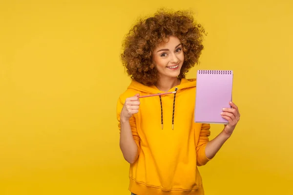 Portrait Cheerful Curly Haired Woman Urban Style Hoodie Showing Pencil — Stock Photo, Image