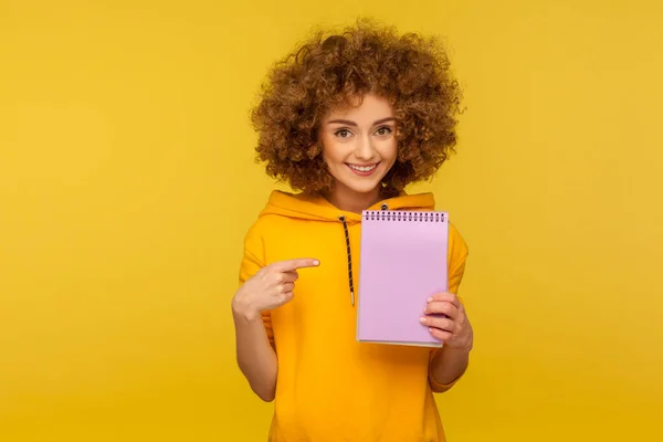 Portrait Positive Curly Haired Woman Urban Style Hoodie Pointing Blank — Stock Photo, Image