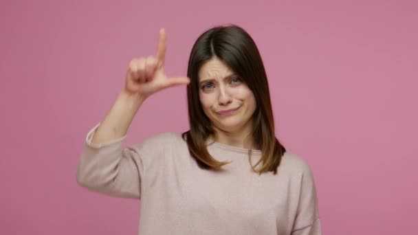 You Lose Brunette Young Woman Making Loser Gesture Sign Forehead — Stock Video