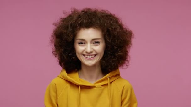 Cheerful Glad Carefree Girl Afro Hairstyle Hoodie Looking Camera Toothy — Stock Video