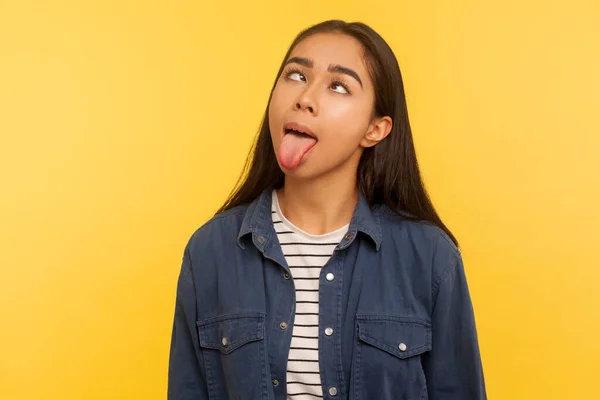 Portrait Funny Dumb Crazy Girl Denim Shirt Showing Tongue Out — 图库照片