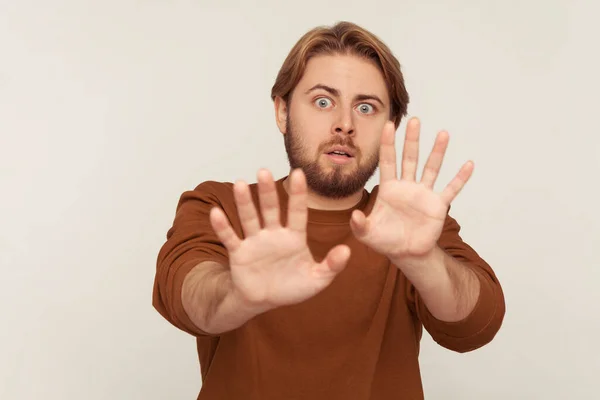 Afraid Portrait Panicking Frightened Man Beard Sweatshirt Raising Hands Stop — Stock Photo, Image