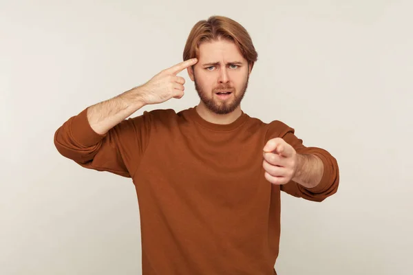 You Idiot Portrait Bearded Man Showing Stupid Gesture Pointing Finger — Stock Fotó