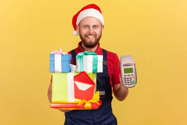 Smiling Male Courier Uniform Santa Claus Hat Holding Parcels Payment — Stock Photo, Image