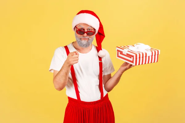 Serious Self Confident Man Costume Sunglasses Holding Present Box Pointing — Stock Photo, Image