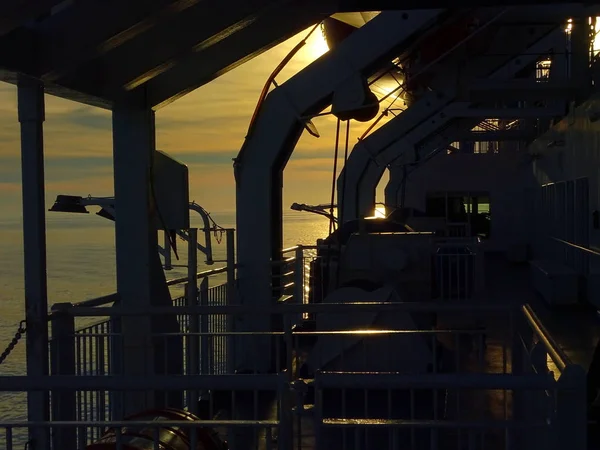 In the ports of Amsterdam and Newcaste on board of a car ferry