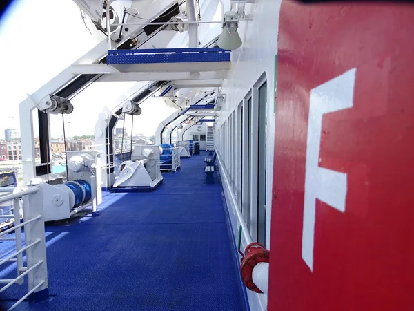 In the ports of Amsterdam and Newcaste on board of a car ferry