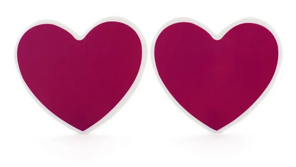 Two pieces of cardboard in the shape of a heart. — Stock Photo, Image