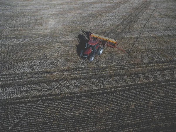 Tractor and seeder, direct sowing in the pampa, Argentina