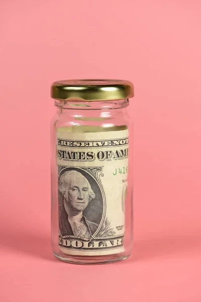 money in jar, saving concept