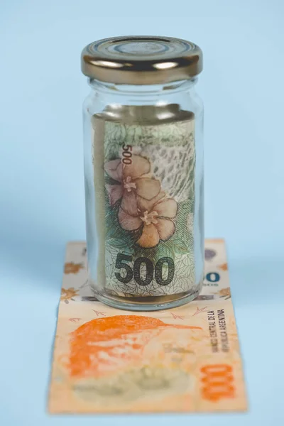 money in jar, saving concept
