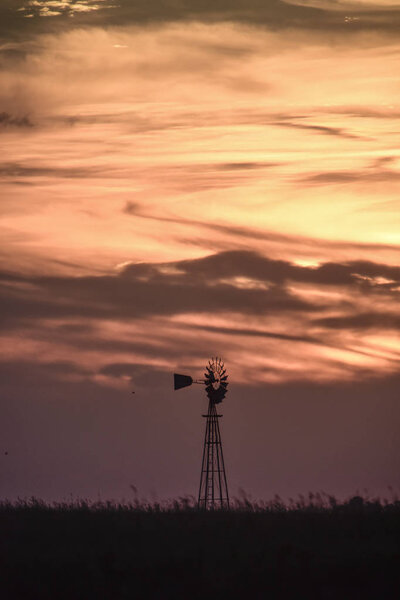Landscape with windmill at sunset, Pampas, Patagonia, Argentina