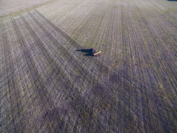 Tractor and seeder, direct sowing in pampa, Argentina