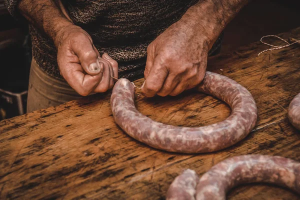 Male Hands Preparing Sausages — Stock Photo, Image