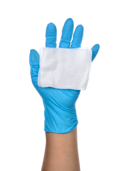 医生手上戴着蓝色乳胶手套的纱布 — 图库照片