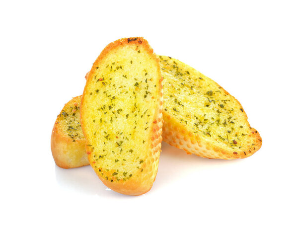 Garlic and herb bread slices on white