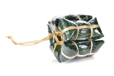 Ekşi domuz eti: kuzeydoğu Tayland stil domuz eti pilav sarımsak şeker ve tuz muz yaprak paket içinde karışık gıda.