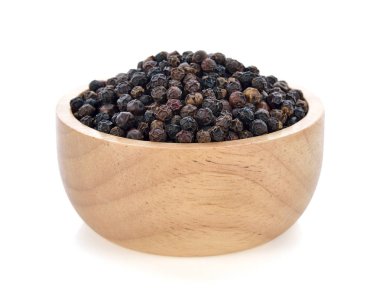 beyaz zemin üzerine karabiber tohumu