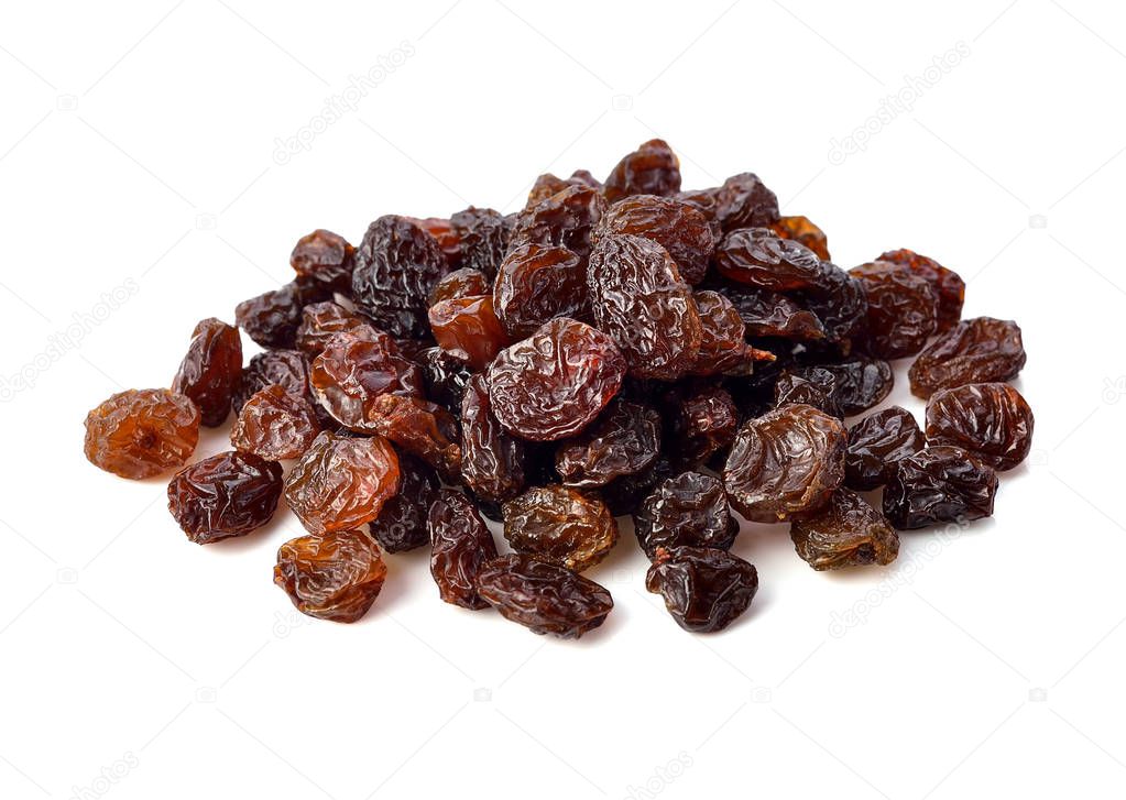 Dried raisins on white background.