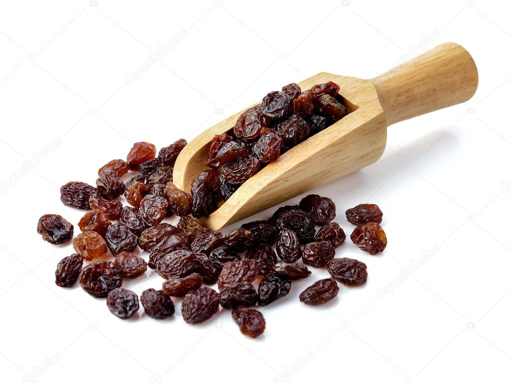 Dried raisins on white background.